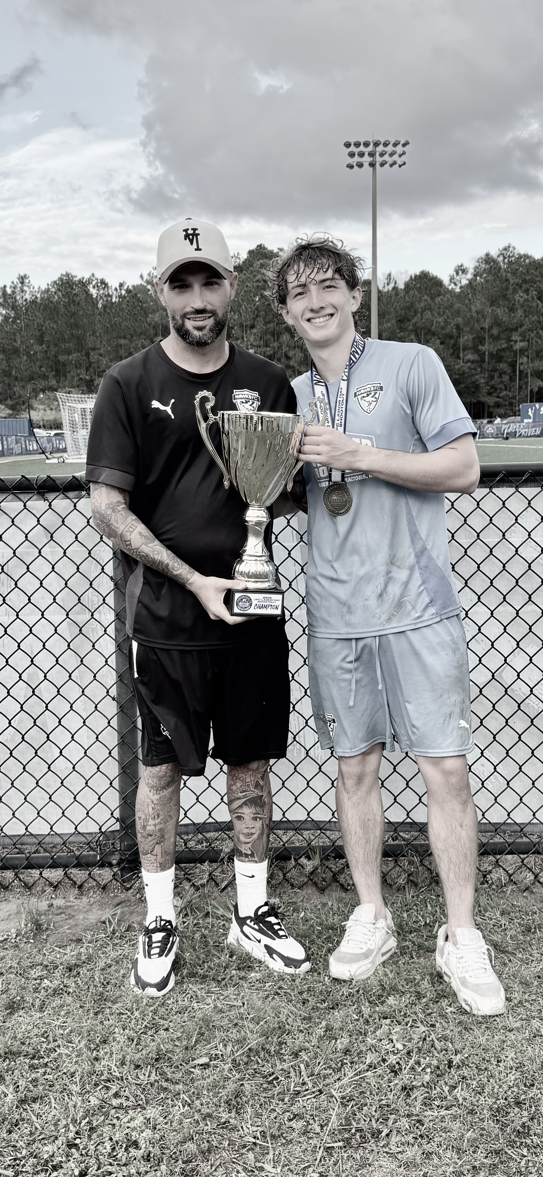 Coach with trophy winner